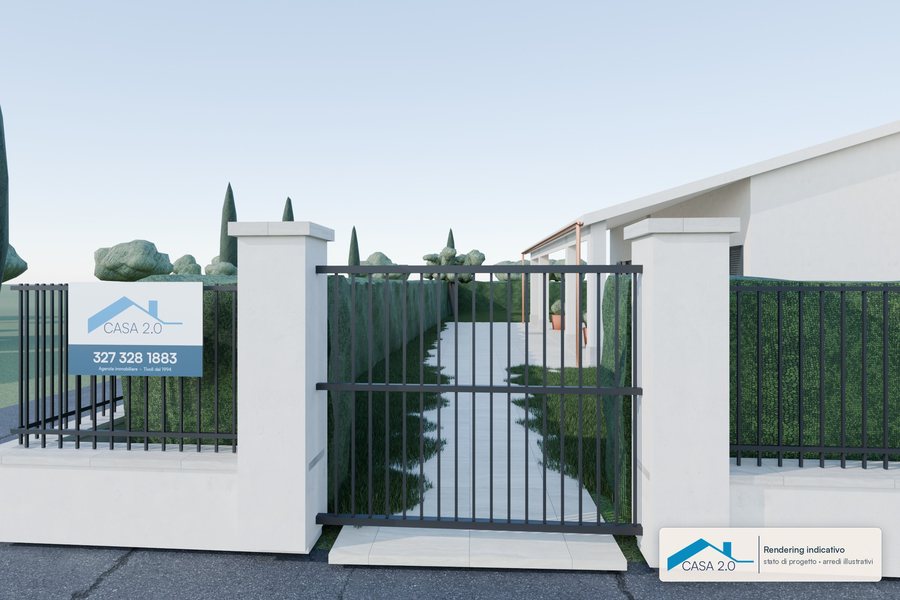 L'ingresso: Il cancello pedonale sulla strada e il percorso verso il portico.